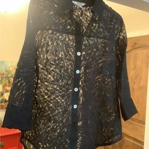 Stonebridge see-thru black over blouse or jacket. Very comfortable.
